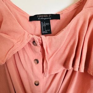 Sleeveless Coral Top with ruffles